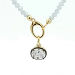 Load image into Gallery viewer, Two-Tone Gold Plated Beaded Necklace with Oval Crystal Pendant
