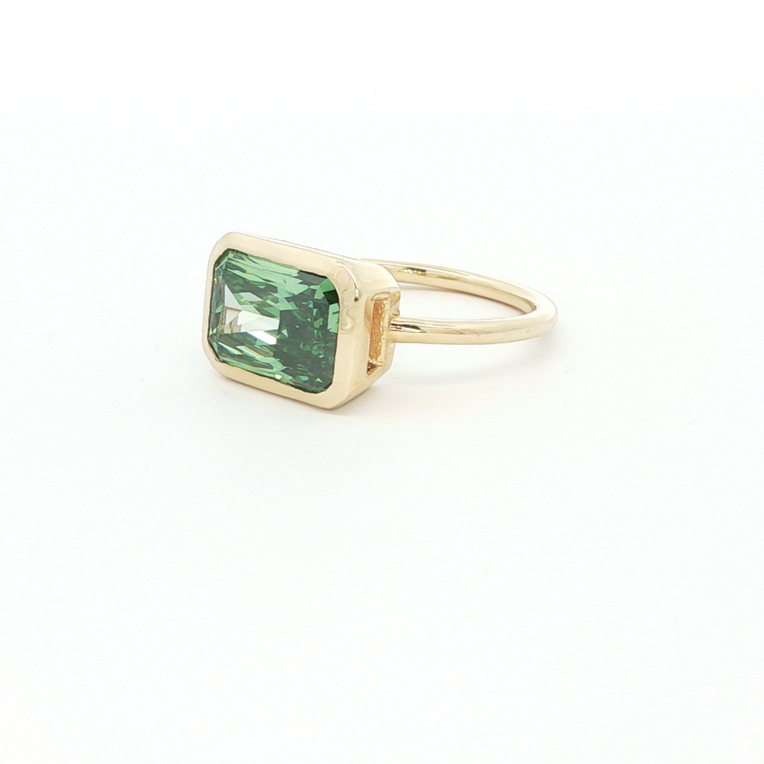 Gold Solitaire Ring with Emerald Cut Green Emerald