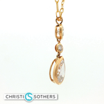 Load image into Gallery viewer, 14KT Yellow Gold Triple-Stone Bezel Necklace with Lab-Grown Round &amp; Pear Diamonds (4.04 cttw)
