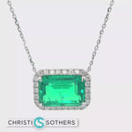 Load and play video in Gallery viewer, 14KT White Gold Lab-Grown Emerald &amp; Diamond Halo Pendant Necklace
