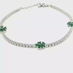 Load and play video in Gallery viewer, Silver Tennis Bracelet with Green Floral Accents
