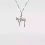Load and play video in Gallery viewer, 14KT Yellow Gold Pavé Diamond Hamsa Pendant Necklace
