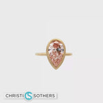 Load and play video in Gallery viewer, Matte 14KT Yellow Gold Fancy Pink Diamond Bezel Solitaire Ring (3.01 ct)
