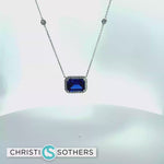 Load and play video in Gallery viewer, 14KT White Gold Necklace with Emerald-Cut Royal Blue Sapphire
