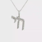 Load and play video in Gallery viewer, 14KT Gold Chai Pendant Necklace With Diamonds – Yellow, Rose &amp; White Gold