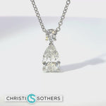 Load and play video in Gallery viewer, 14KT White Gold 0.95ct Lab Pear &amp; Round Diamond Necklace
