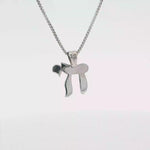 Load and play video in Gallery viewer, 14KT Yellow and White Gold Chai pendant (small)
