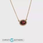 Load and play video in Gallery viewer, 14KT Yellow Gold Oval Garnet Cabochon Charm Necklace with Diamond Accents (0.95 ct)