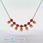 Load and play video in Gallery viewer, 18KT Yellow Gold Garnet &amp; Opal Charm Necklace with Diamond Accents (9.61 cttw)