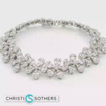 Load and play video in Gallery viewer, 18KT White Gold Diamond Flower-Motif Bracelet (6.78 cttw)
