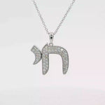Load and play video in Gallery viewer, 14KT White Gold Diamond Pavé Chai Pendant Necklace (0.51 cttw diamonds)
