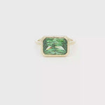 Load and play video in Gallery viewer, Gold Solitaire Ring with Emerald Cut Green Emerald
