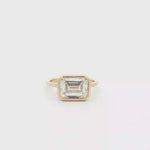 Load and play video in Gallery viewer, Yellow Gold Solitaire Ring with Emerald Cut Diamond
