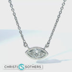 Load and play video in Gallery viewer, 14KT White Gold 0.97ct Lab Marquise Diamond Bezel Set Solitaire Necklace
