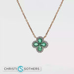 Load and play video in Gallery viewer, 18kt Yellow Gold Flower Necklace with Pear Emeralds