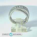 Load and play video in Gallery viewer, 14KT White Gold 0.99ct Lab‑Grown Round Diamond Crossover Band Ring
