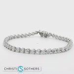 Load and play video in Gallery viewer, 14KT White Gold Heart-Shaped Diamond Tennis Bracelet with Lab-Grown Diamonds (6.93 cttw)